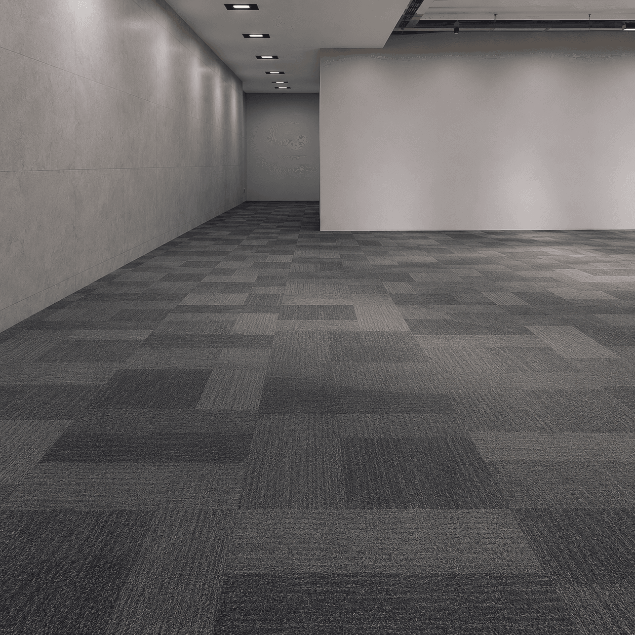 Nylon carpet tiles in quarter-turn modular layout showing checkerboard pile