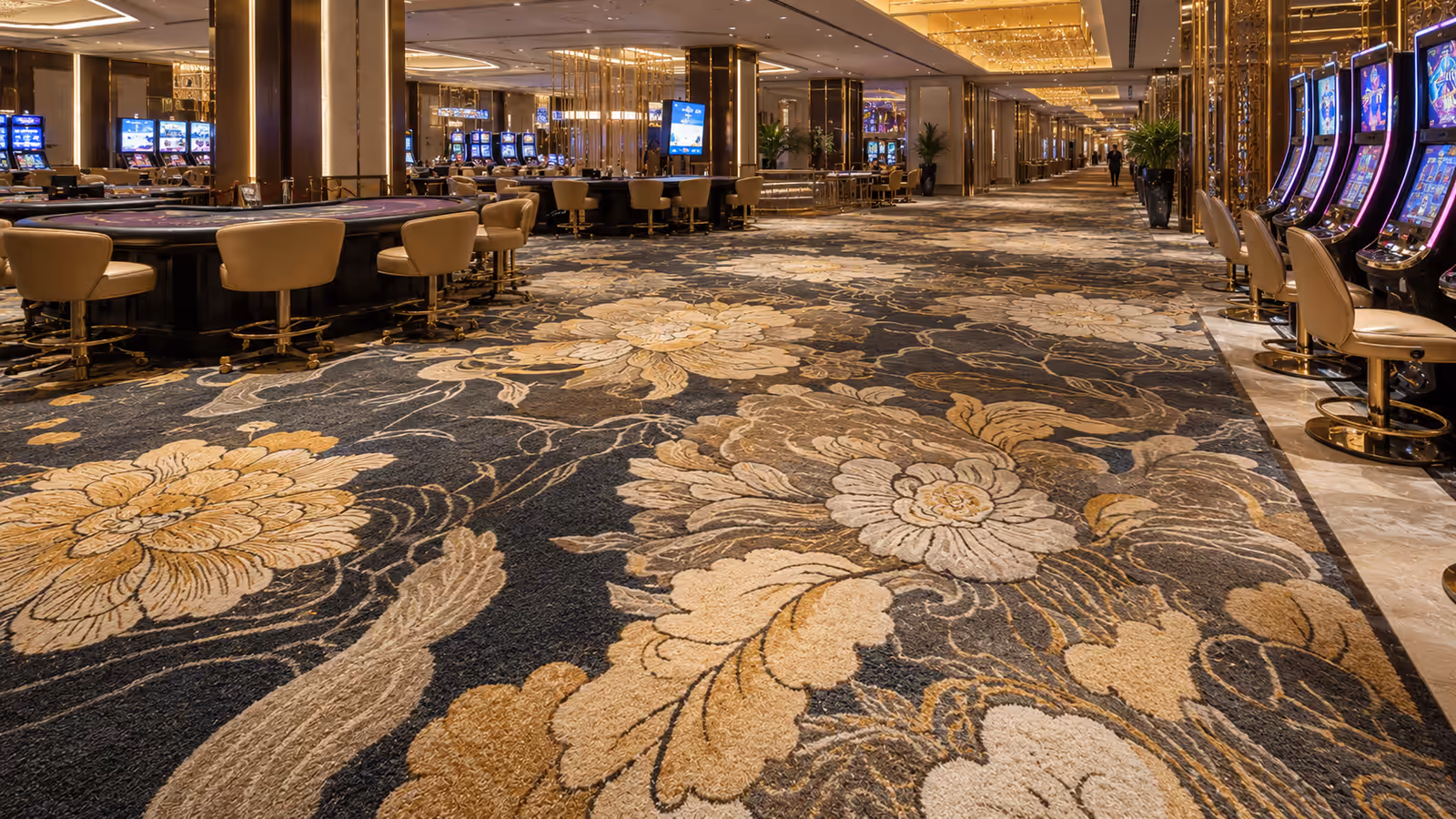 Singapore casino floor with oriental floral carpet and warm gaming corridor lighting