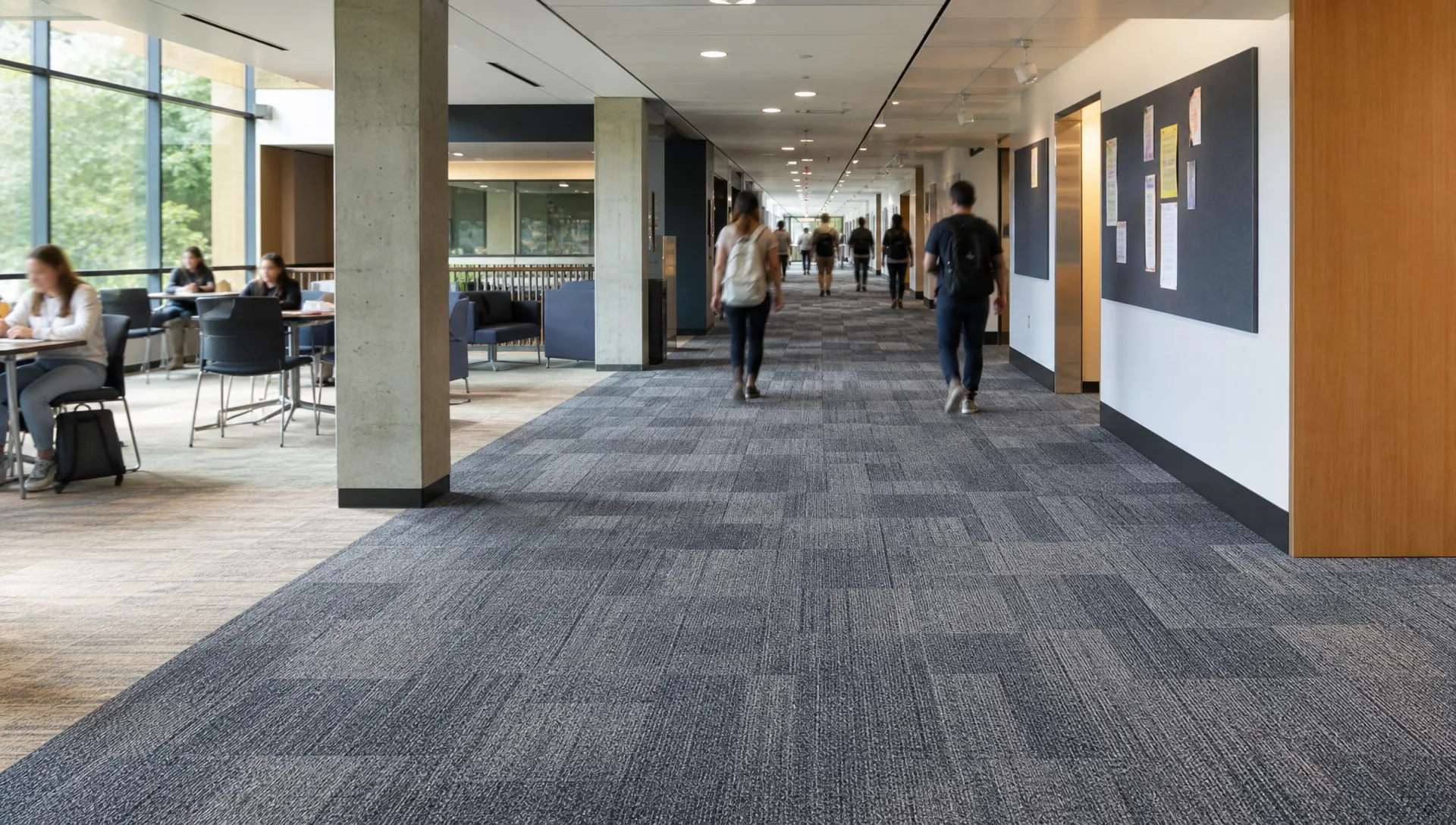 University corridor with modular carpet tiles in a high-traffic education zone