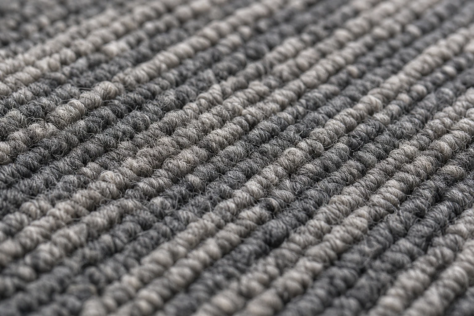 Close-up of solution-dyed loop pile texture on EcoCore commercial carpet tile