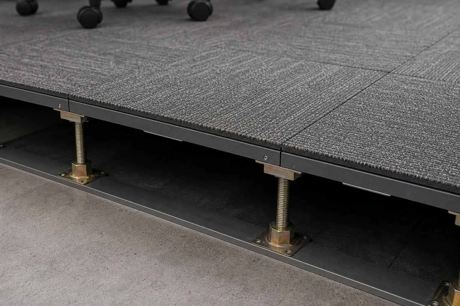 EcoCore modular carpet tiles installed on commercial raised floor system